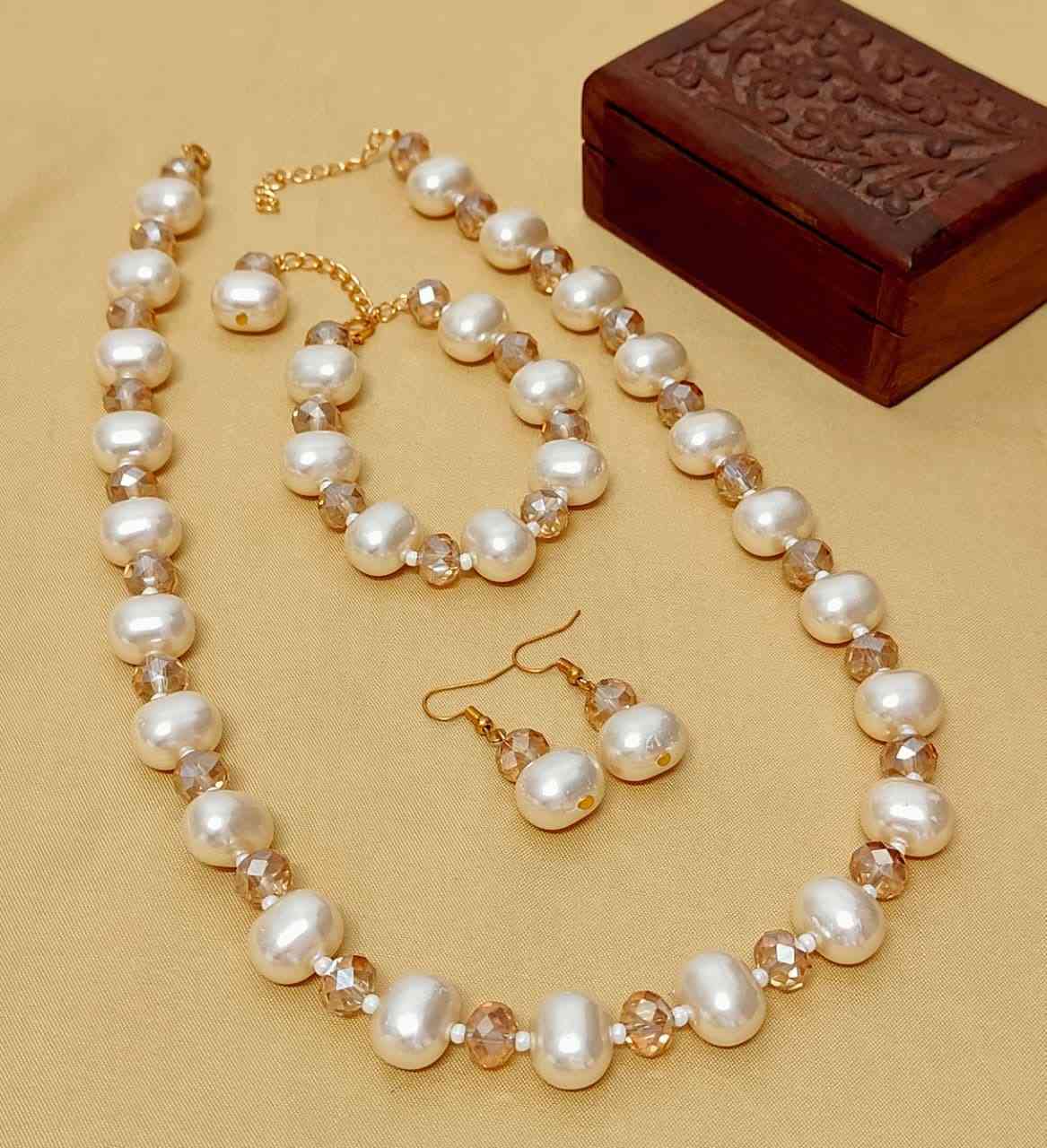 Beautiful Premium Quality Pearl Mala With Tops And Bracelet Combo...